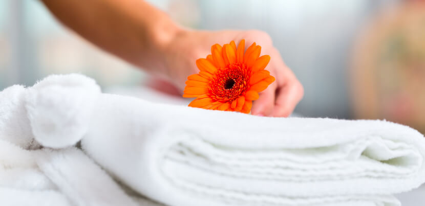 housekeeping-making-bed-in-hotel