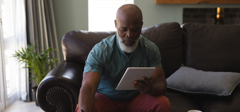 Older-Man-Using-Tablet