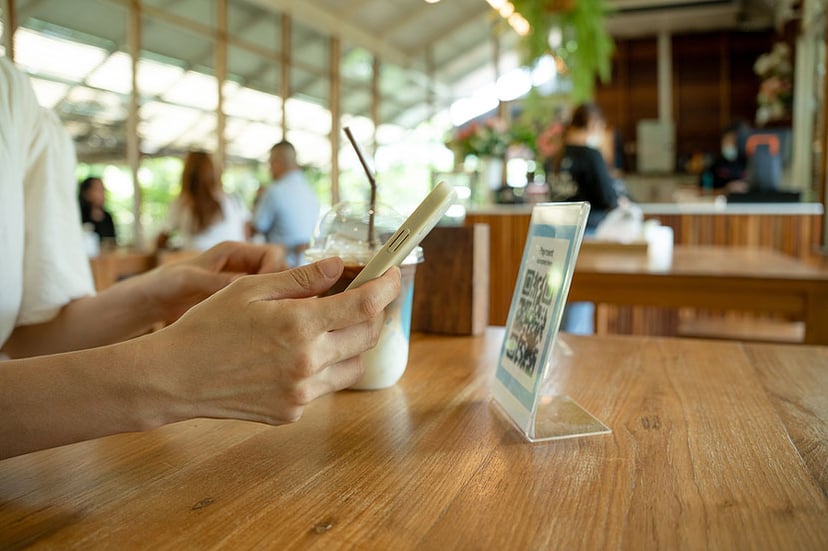 Scan QR code at a restaurant