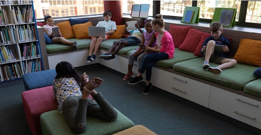 children-reading-with-friends-at-the-library