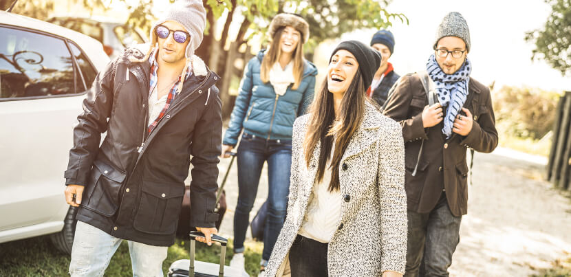 genz-millenial-friends-arriving-at-hotel