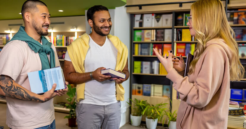 group-of-people-talking-in-library