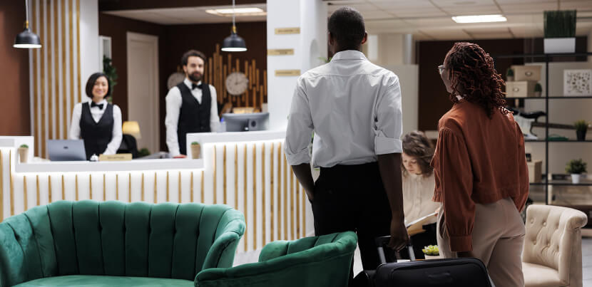 guests-arriving-in-hotel-lobby