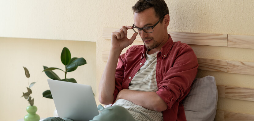 man-using-laptop-in-hotel