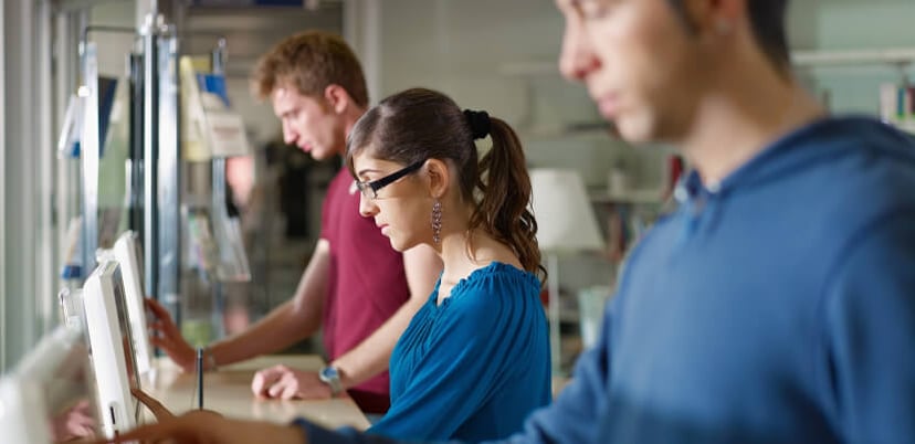 patrons-using-touchscreens-at-library