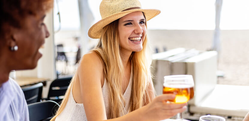 smiling-woman-enjoying-drink