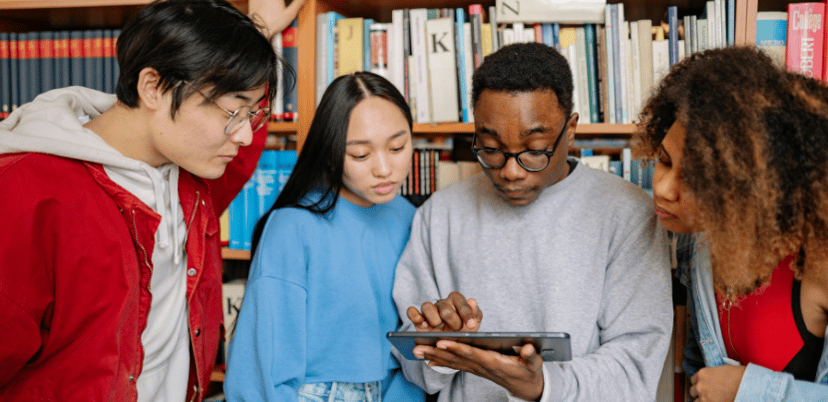 young-people-with-tablet-in-library