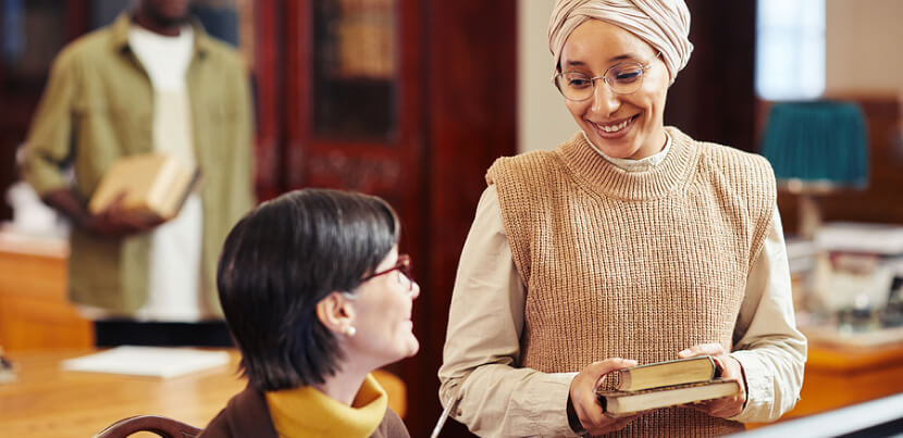 two-librarian-colleagues-having-discussion