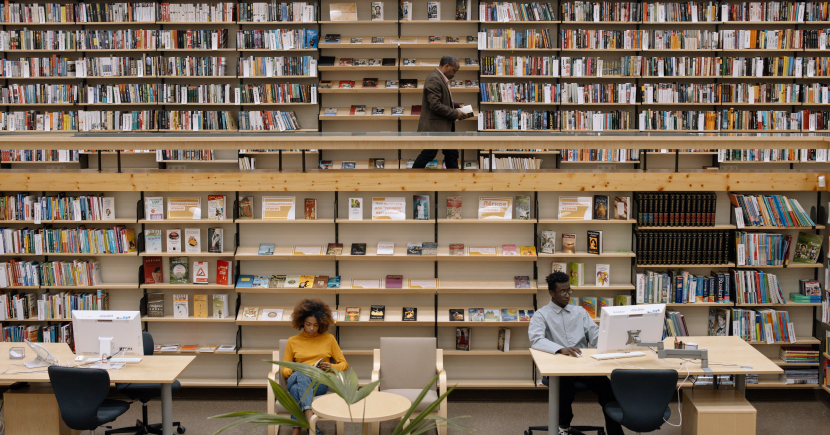 young people at a library with computers