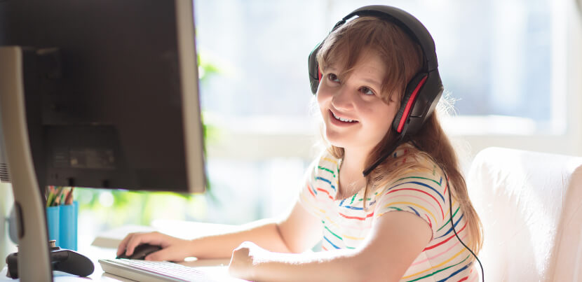 young-girl-doing-homework-on-computer