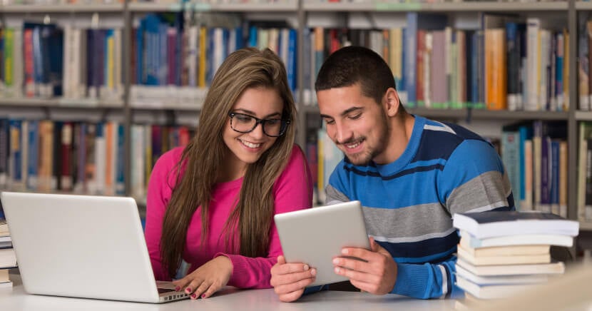 Couple-of-Students-At-Library